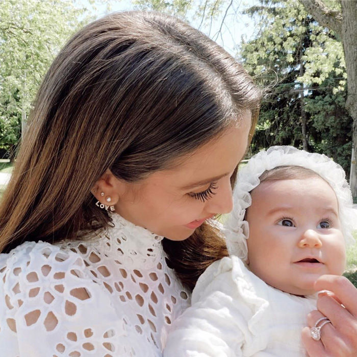 Ana Luisa Jewelry Woman holding baby